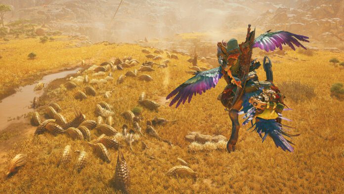 monsterhunterwildsa A hunter flies over a herd of animals in the game Monster Hunter Wilds review