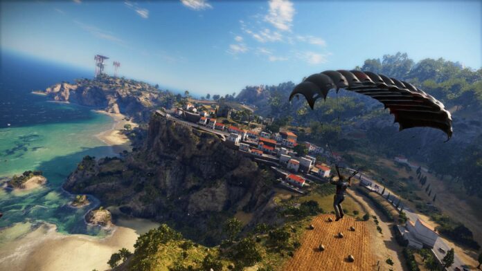 just cause 3 cover A screenshot of a paraglider over a Mediterranean seaside cliffside town in Just Cause 3