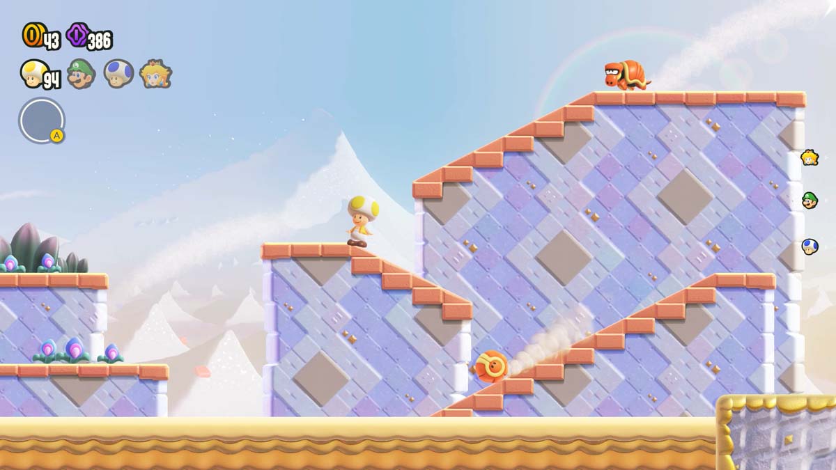 A character in a yellow hat sliding down a snowy slope in a Super Mario Bros. game level.