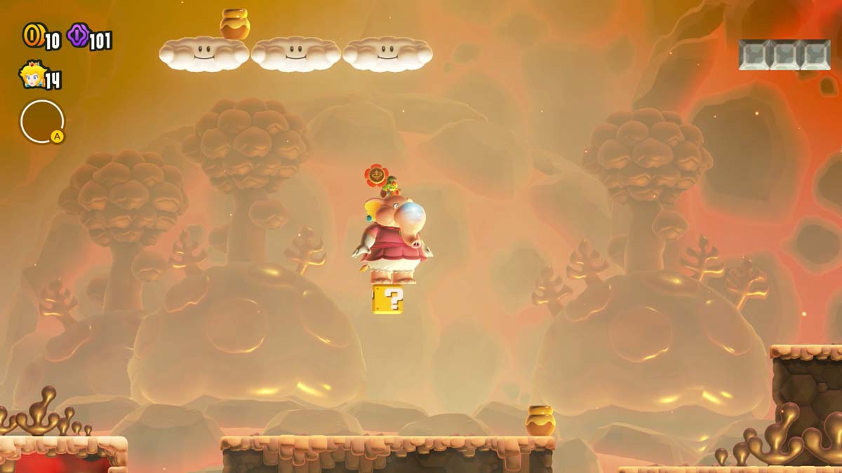 Princess Peach striking a block in a level filled with golden lava and ominous clouds.