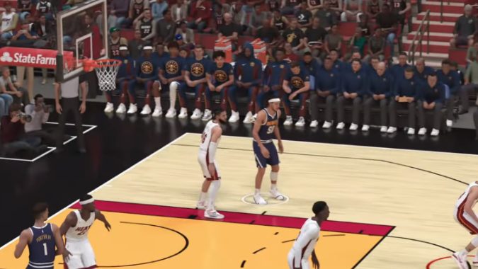 Screenshot of NBA 2k24 gameplay showing players on the court during a match