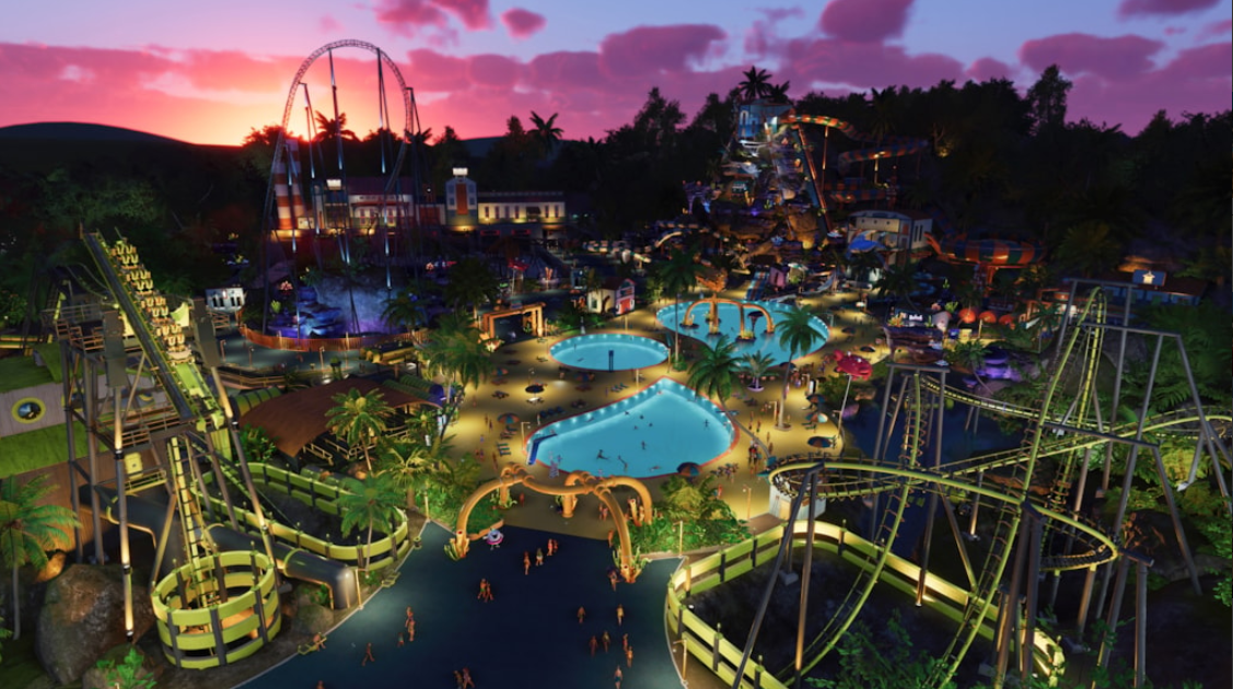 A screenshot from Planet Coaster 2 showing a theme park with multiple roller coasters at sunset